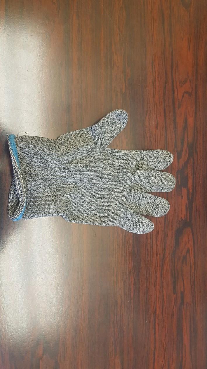 A protective glove is made up of steel and fabric.