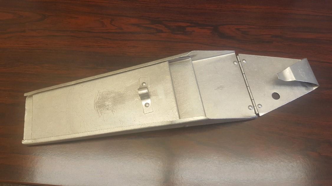 A metal scabbard is a receptacle for knives that can be strapped on during butchering.