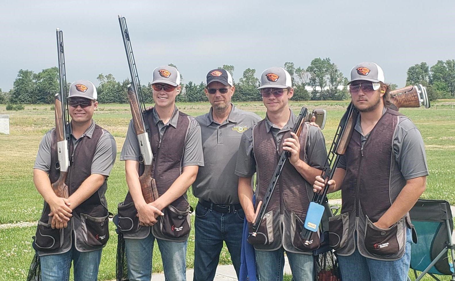 4-H shotgun competitors Carson King (from left), Logan Lee, Coach Kevin Tollefson, James Lange and Seth Colton.