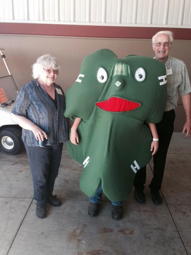 Fay and Sherm Sallee at the Oregon State Fair in 2018 with their grandson Conner who was wearing a 4-H clover costume.