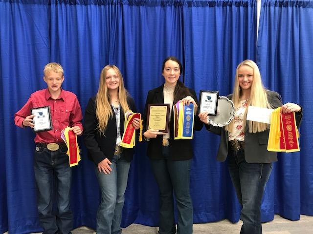 OSU Extension 4-H horse judging team poses with their ribbons and plaques at the Eastern National 4-H Horse Roundup.
