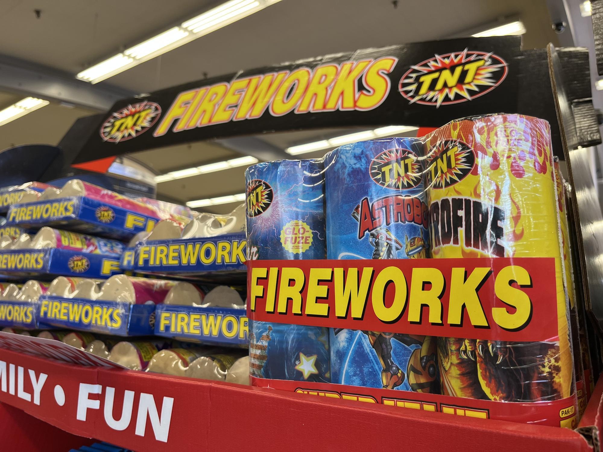 A fireworks stand selling an assortment of products for the 4th of July.