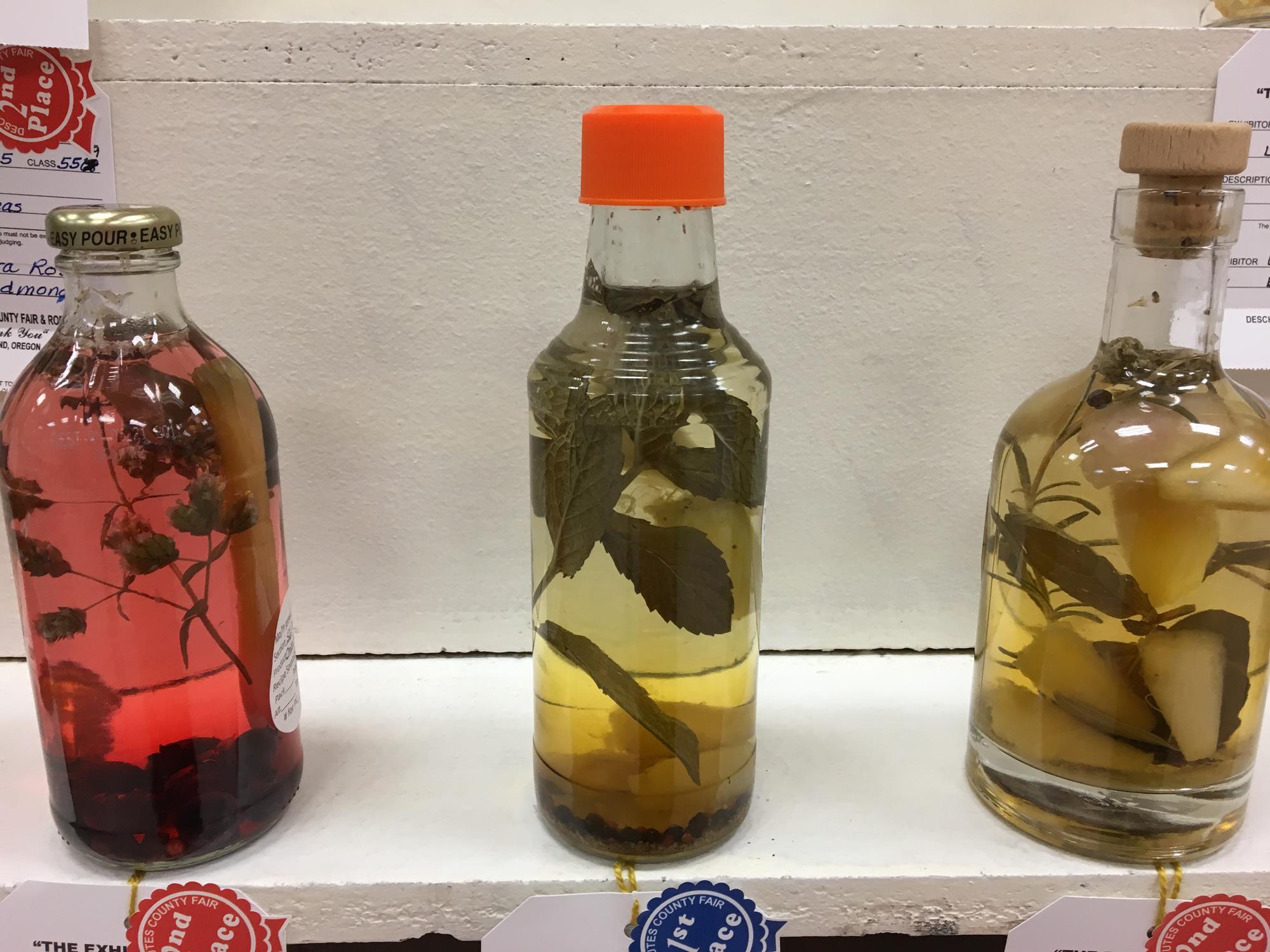 Flavored vinegars display, three bottles