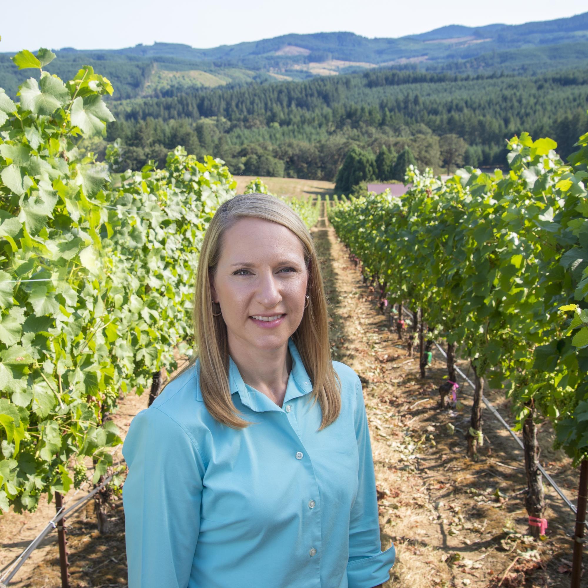 Patty Skinkis stands in Oregon State University's Woodhall Vineyard