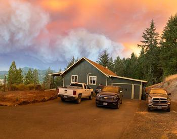 Smoke fills the sky above Alicia Christiansen's home in Glide, Oregon, on Sept. 8.