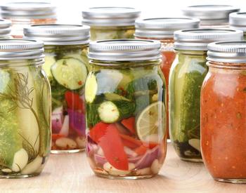 Food preserved in glass jars