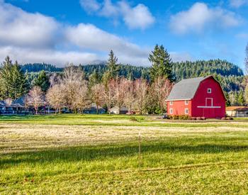 A red barn near the McKenzie river in Oregon.